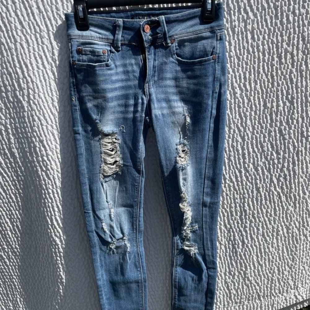 Skinny ripped jeans/jeggings size 1